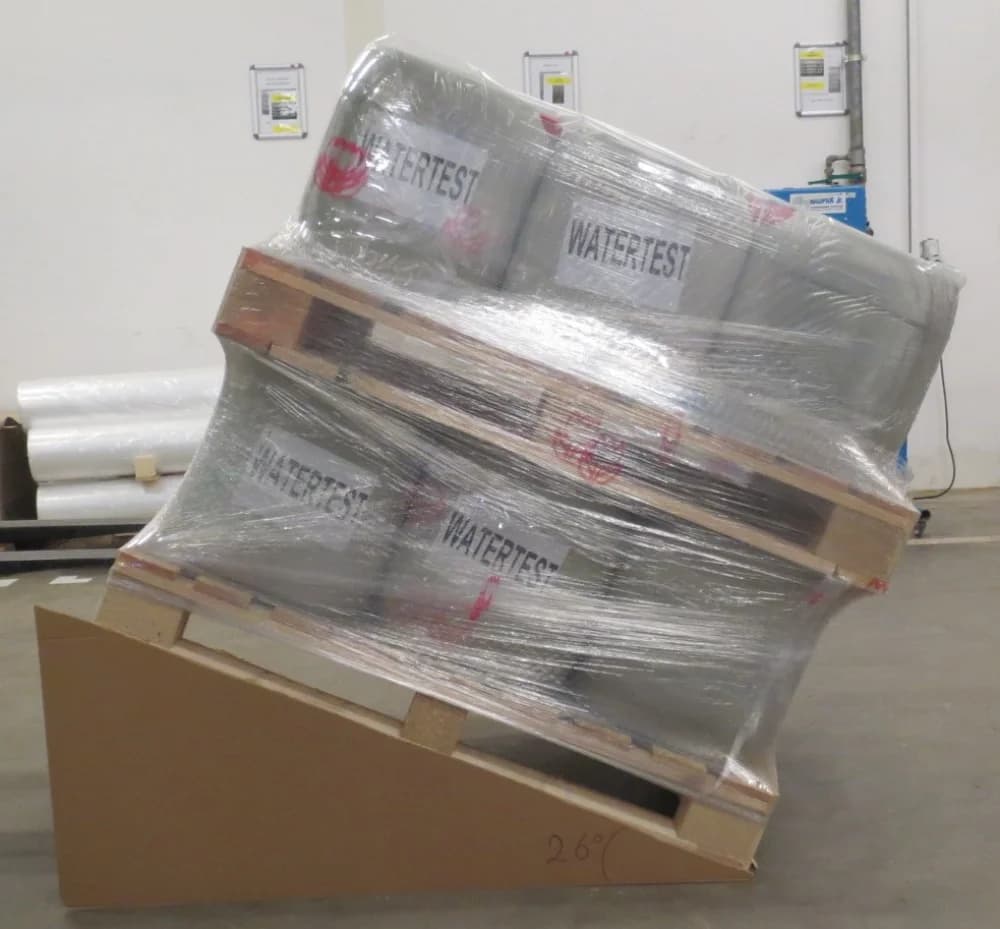 Wrapped pallet on 26-degree tilt test verifying load stability