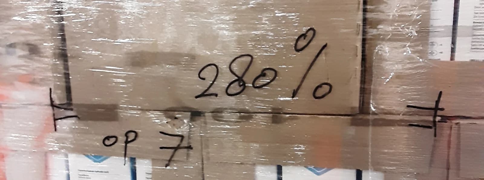 Pre-stretch percentage marking written on wrapped pallet film